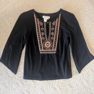 Coldwater Creek. Black flowy blouse with copper embellishment design.